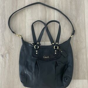 Coach Black Shoulder Bag with Structured Design and Metallic Accents